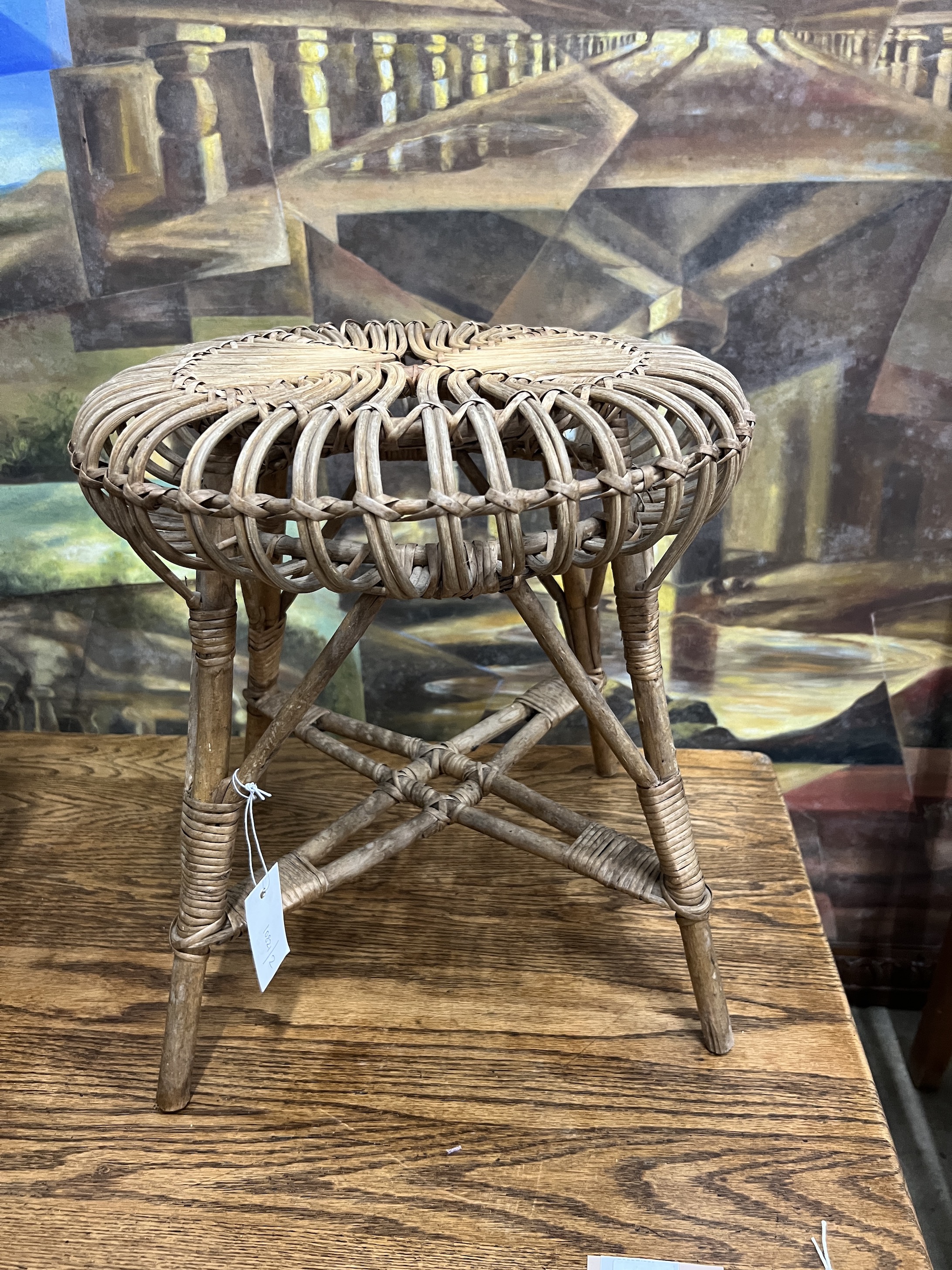 A Franco Albini caned lobster stool, diameter 41cm, height 41cm
